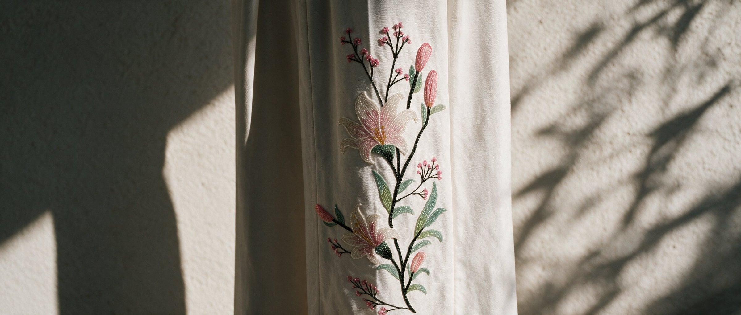 Hand-embroidered lilies on the Lily Blazer Suit trouser