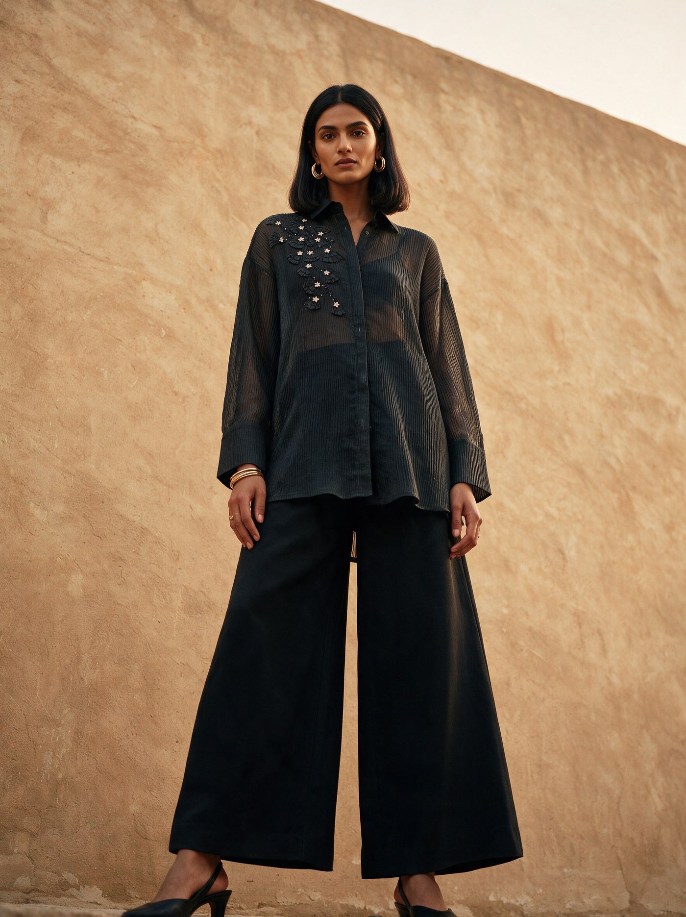 The Plissé Shirt — three-quarter view, Pummy Walia