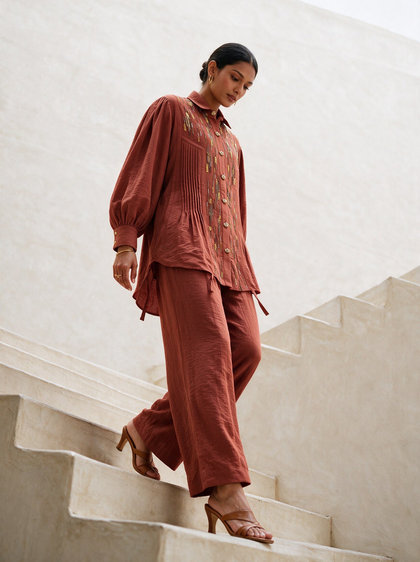 The Terracotta Pintuck Set — three-quarter view, Pummy Walia